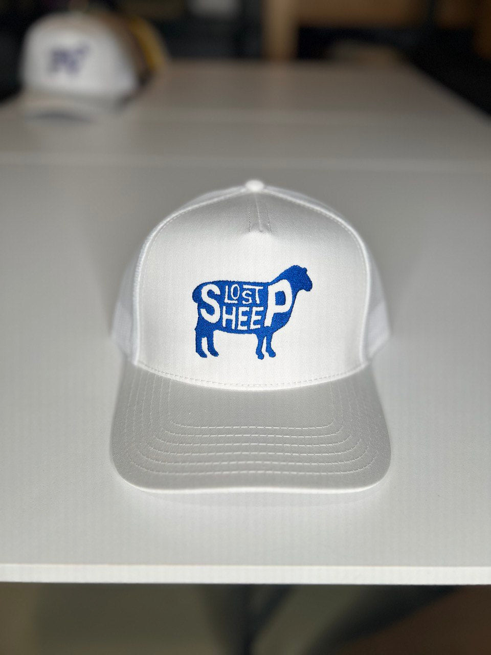 The Lost Sheep Trucker Hat